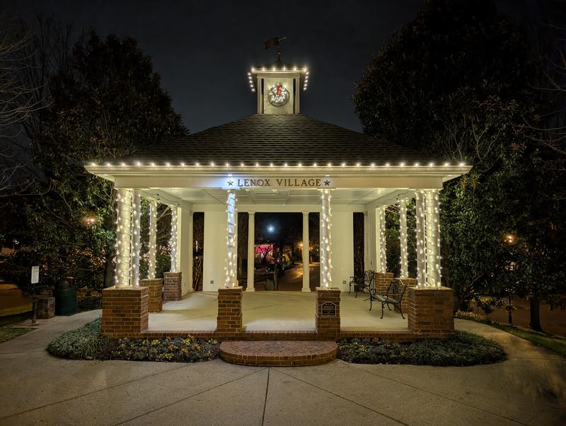 Neighborhood gazebo with wrapped columns and a wreath